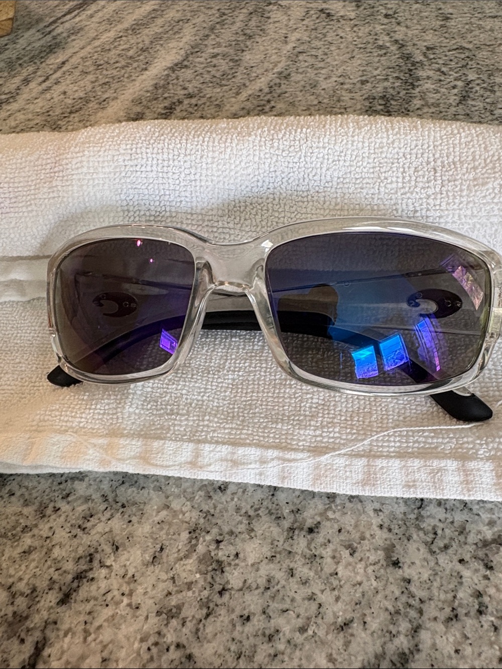 Costa clear frame sunglasses.